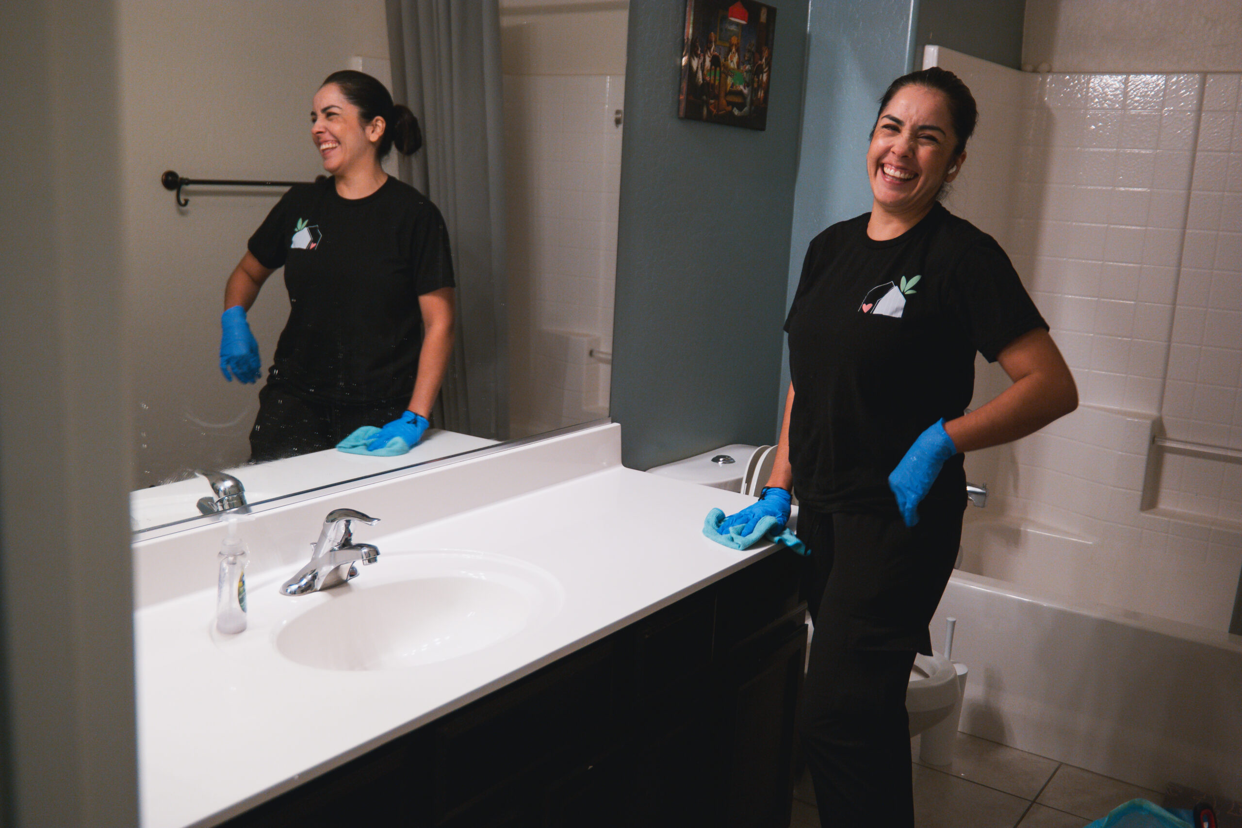 spa-4 Heart & Home team member in clean bathroom